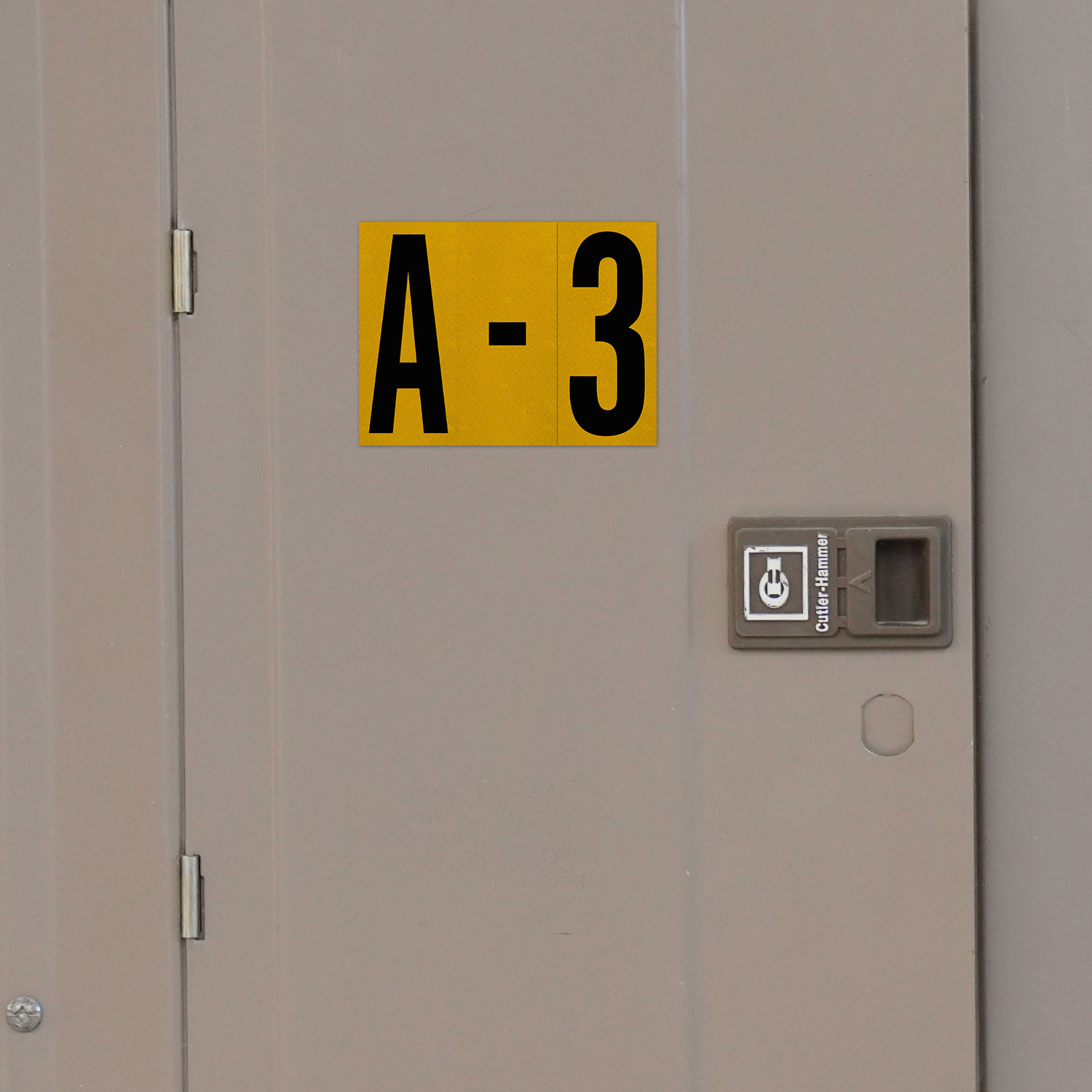 3.75" Black Character on Yellow EG Reflective Vinyl Label