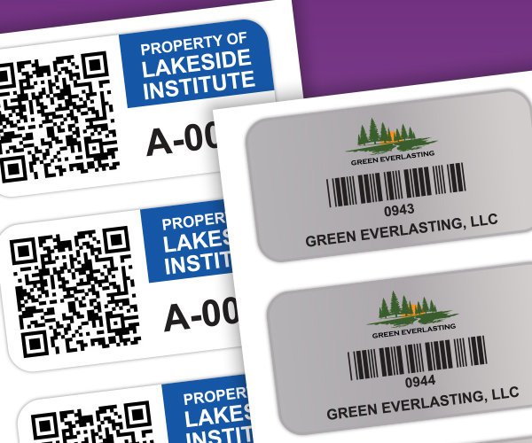 Three QR code asset tags and two metallic asset tags